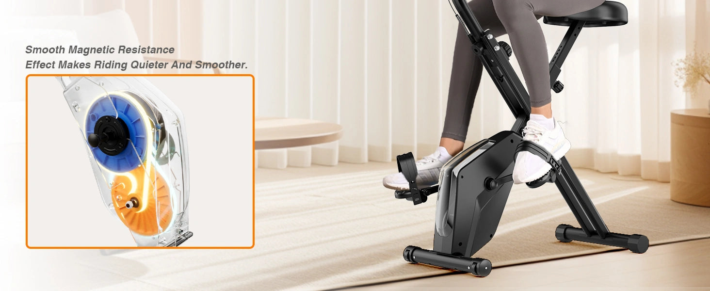 Personne utilisant un vélo d'exercice à résistance magnétique, gros plan sur le mécanisme de résistance.